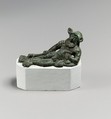 Bronze statuette of a satyr reclining on a lion's skin, Bronze, Etruscan