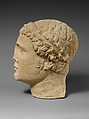 Limestone head of beardless male votary, Limestone, Cypriot