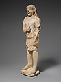Limestone statuette of a beardless male votary in Egyptianizing dress, Limestone, Cypriot