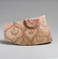 Terracotta vessel fragment with reticulated pattern enclosing conventional flowers, Terracotta, Minoan