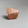 Terracotta vessel fragment with rosettes, Terracotta, Minoan