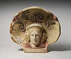 Terracotta antefix (roof tile) with head of a maenad, Terracotta, Etruscan, Cerveteri