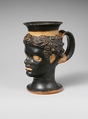 Terracotta mug in the form of a Black African youth's head, Terracotta, Etruscan