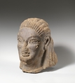 Tufa head of sphinx or siren, Tufa, Etruscan, probably Vulcian