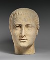 Limestone head of a beardless male votary, Limestone, Cypriot
