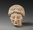 Limestone beardless male head with ivy wreath, Limestone, Cypriot