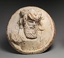 Marble disk with a herm of Dionysus in relief, Marble, Roman
