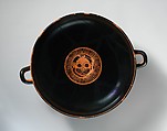 Terracotta kylix: eye-cup (drinking cup), Signed by Nikosthenes as potter, Terracotta, Greek, Attic
