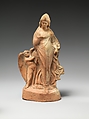 Terracotta statuette of dancing Aphrodite with Eros, Terracotta , Greek, perhaps Corinthian