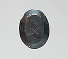 Haematite intaglio: Youth on inscribed stele, Haematite, Roman
