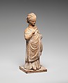 Terracotta statuette of a standing girl, Terracotta, Greek, probably Boeotian
