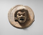 Two terracotta roundels with theatrical masks, Terracotta, Greek
