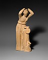 Terracotta statuette of a woman looking into a box mirror, Terracotta, Greek, probably West Greek, possibly Centuripe