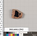 Terracotta fragment of a kylix (drinking cup), Terracotta, Greek, Attic