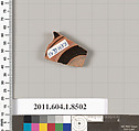 Terracotta fragment of a stemless kylix (drinking cup), Terracotta, Greek, Attic