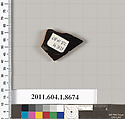 Terracotta fragment of a stemless kylix (drinking cup), Terracotta, Greek, Attic