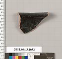 Terracotta fragment of a mastoid (drinking cup with narrow base), Terracotta, Greek, Attic