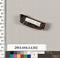 Terracotta fragment of a mastoid (drinking cup with narrow base), Terracotta, Greek, Attic