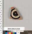 Terracotta fragment of a kylix: eye-cup (drinking cup), Terracotta, Greek, Attic
