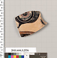 Terracotta fragment of a kylix: eye-cup (drinking cup), Terracotta, Greek, Attic
