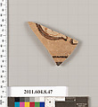 Terracotta fragment of a kylix: eye cup (drinking cup), Terracotta, Greek, Corinthian?