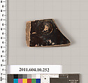 Terracotta fragment of a closed shape, Terracotta, Etruscan
