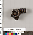 Terracotta fragment of a handle, Terracotta, Etruscan