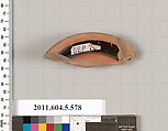 Terracotta fragment of a stemless kylix (drinking cup), Terracotta, Greek, Attic