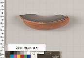 Terracotta fragment of a lamp, Terracotta, Greek, Attic
