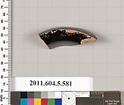 Terracotta fragment of a stemless kylix (drinking cup)?, Terracotta, Greek, Attic