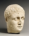 Limestone head of a beardless male votary, Limestone, Cypriot