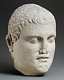 Limestone head of beardless male votary, Limestone, Cypriot