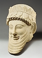 Limestone head of a man, Limestone, Cypriot