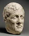 Limestone head of beardless male votary, Limestone, Cypriot