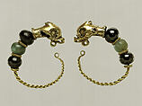 Gold, beryl, and garnet earring with head of a dolphin, Gold, beryl, garnet, Cypriot
