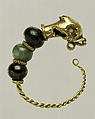 Gold, beryl, and garnet earring with head of a dolphin, Gold, beryl, garnet, Cypriot