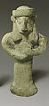 Standing figure holding a tambourine(?), Terracotta, Cypriot