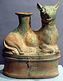 Terracotta askos in the shape of a reclining dog, Glazed terracotta (green and yellow), Roman