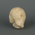 Marble head of a female statuette, Marble, Roman