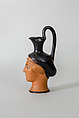 Oinochoe in the form of a woman's head, Class S: The Canessa Class of Head Vases, Terracotta, Greek