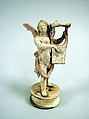 Terracotta statuette of Eros playing a lyre, Terracotta, Greek