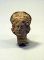 Head of a woman from a statuette, Terracotta, Greek, Asia Minor