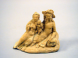 Terracotta group of a reclining youth, woman, and child, Terracotta, Greek, South Italian, Tarentine