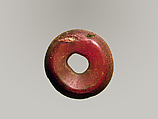 Pierced disk, perhaps from an earring or fibula (safety pin), Amber, Etruscan or Italic