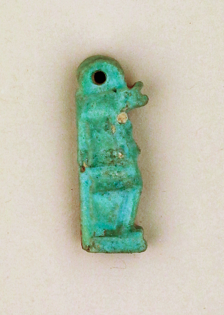 Faience amulet of Isis suckling the infant Horus