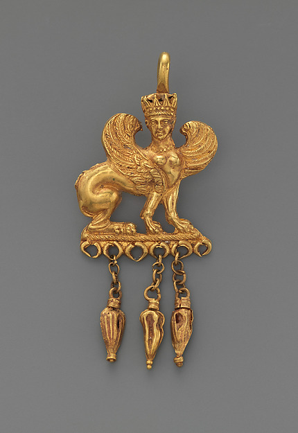 Gold earring with a sphinx