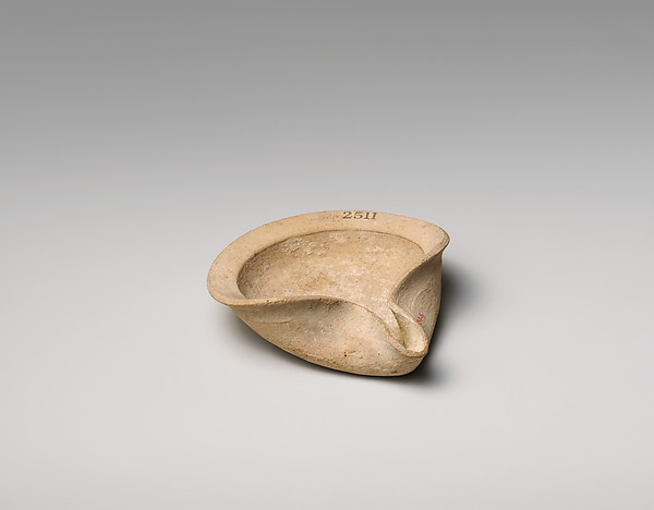 Terracotta saucer-shaped lamp by an unrecorded maker, The Metropolitan Museum of Art