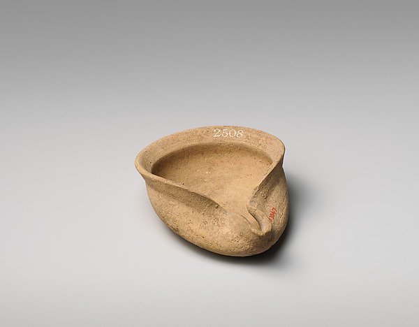 Terracotta saucer-shaped lamp by an unrecorded maker, The Metropolitan Museum of Art