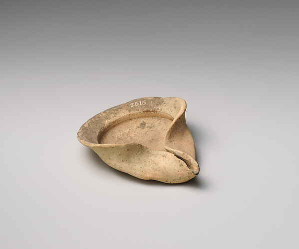 Terracotta saucer-shaped lamp by an unrecorded maker, The Metropolitan Museum of Art