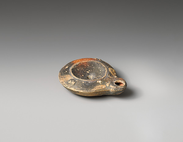 Terracotta oil lamp by an unrecorded maker, The Metropolitan Museum of Art